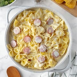 Creamy, Sausage Alfredo Pasta is a quick and versatile dinner recipe that is on the table in under 30 minutes! Noodles are tossed in a hearty, cheesy, alfredo sauce and sausage for an easy, satisfying meal.