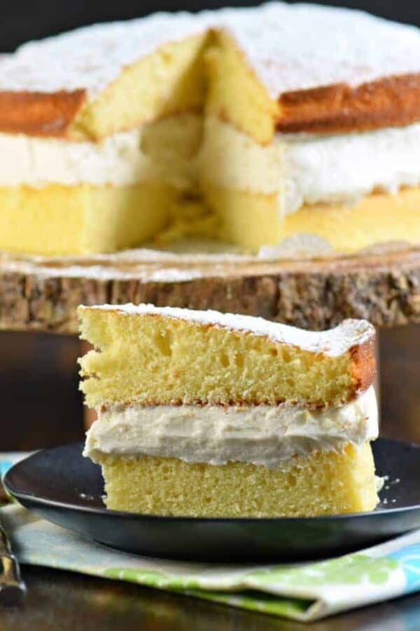 Delicious Twinkie Cake made with yellow cake and sweet whipped cream filling. The perfect, not overly sweet, cake recipe! #twinkie #copycatrecipe #yellowcake