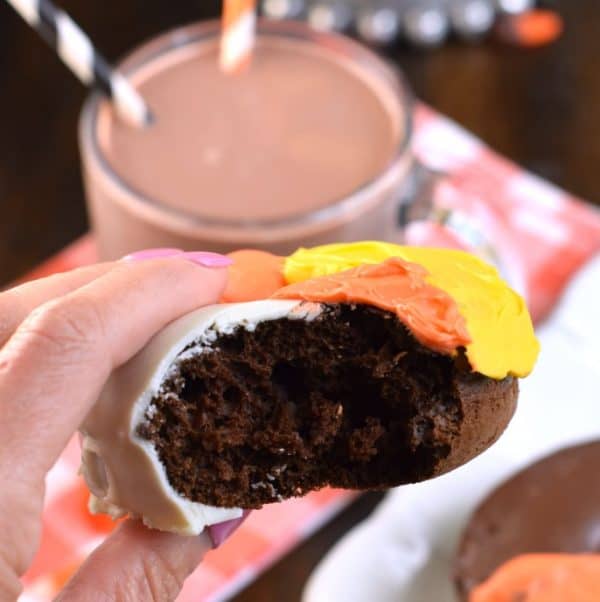 Rich and fudgy chocolate donuts with candy corn frosting!