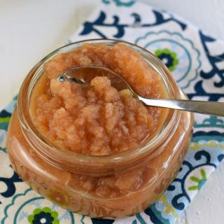Small mason jar with applesauce.