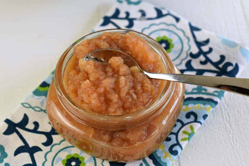 Small mason jar with applesauce.