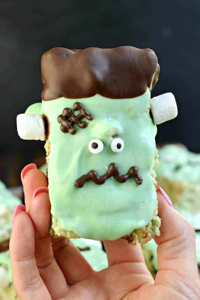 Mint chocolate chip rice krispie treats decorated to look like Frankenstein,