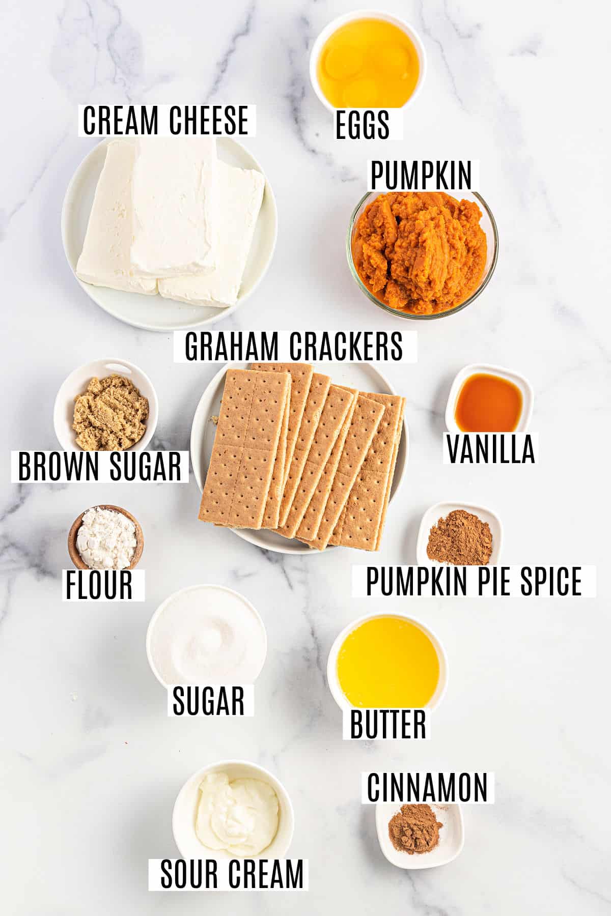 Ingredients needed to make pumpkin cheesecake bars.