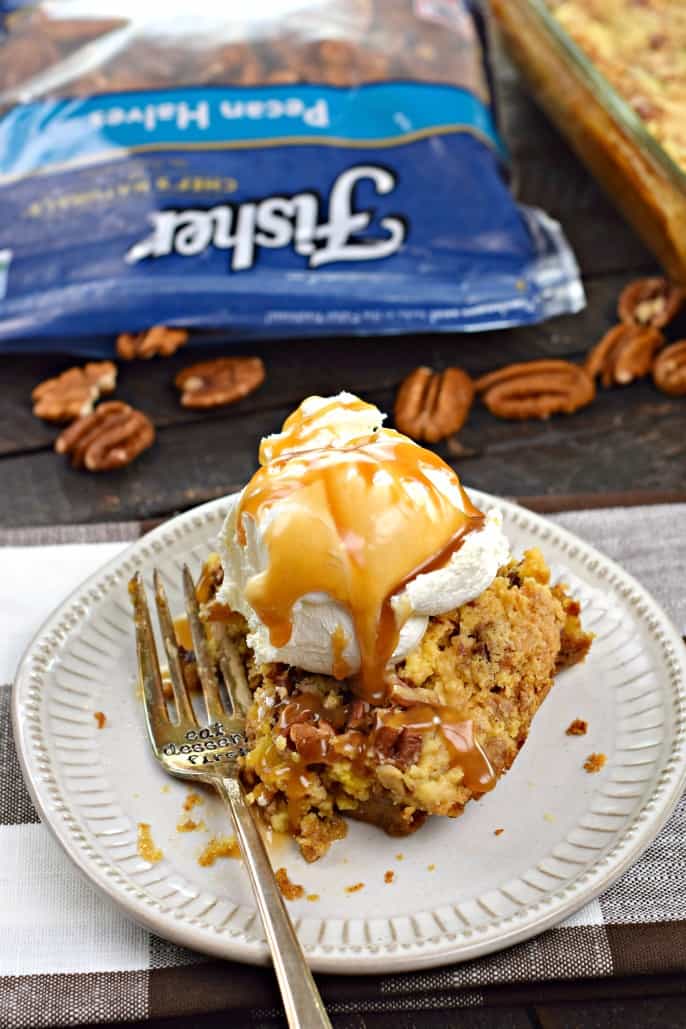 One bite of this Pumpkin Crunch Cake removed with a fork.