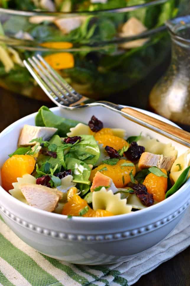 Mandarin Pasta Salad in a white bowl with a fork.