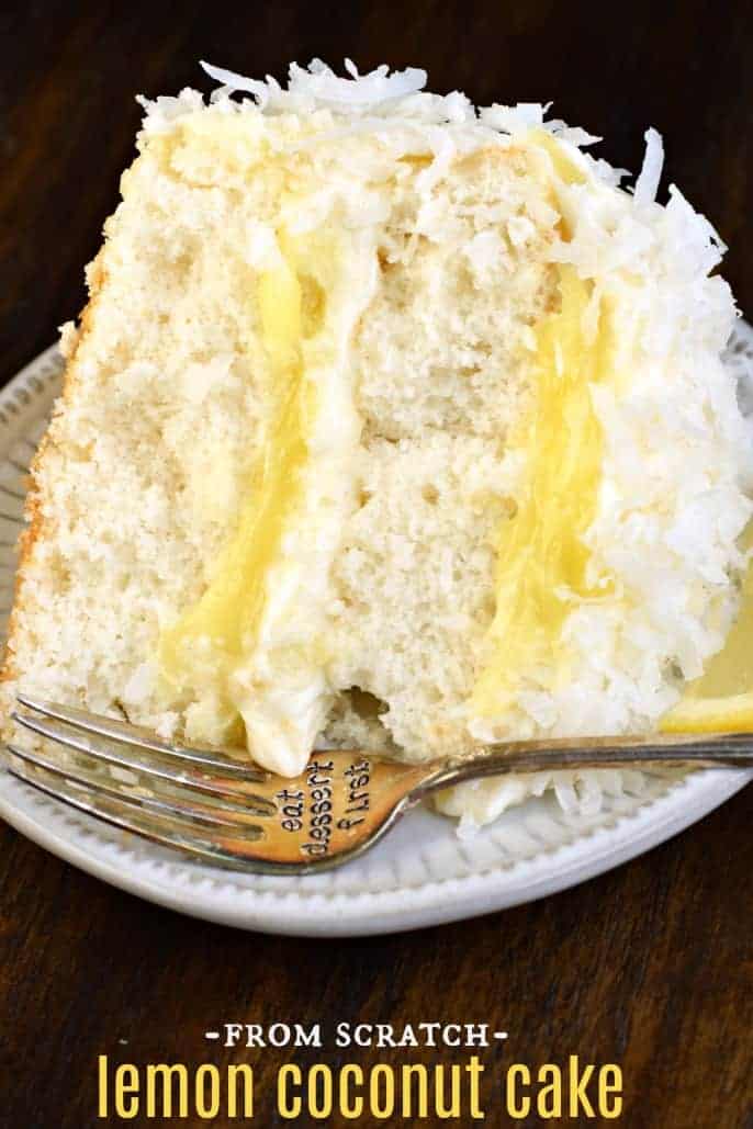 The very best, from scratch, Lemon Coconut Cake recipe #coconut #cake #lemon #creamcheesefrosting Slice of white cake with forsting, lemon curd, and coconut on top.