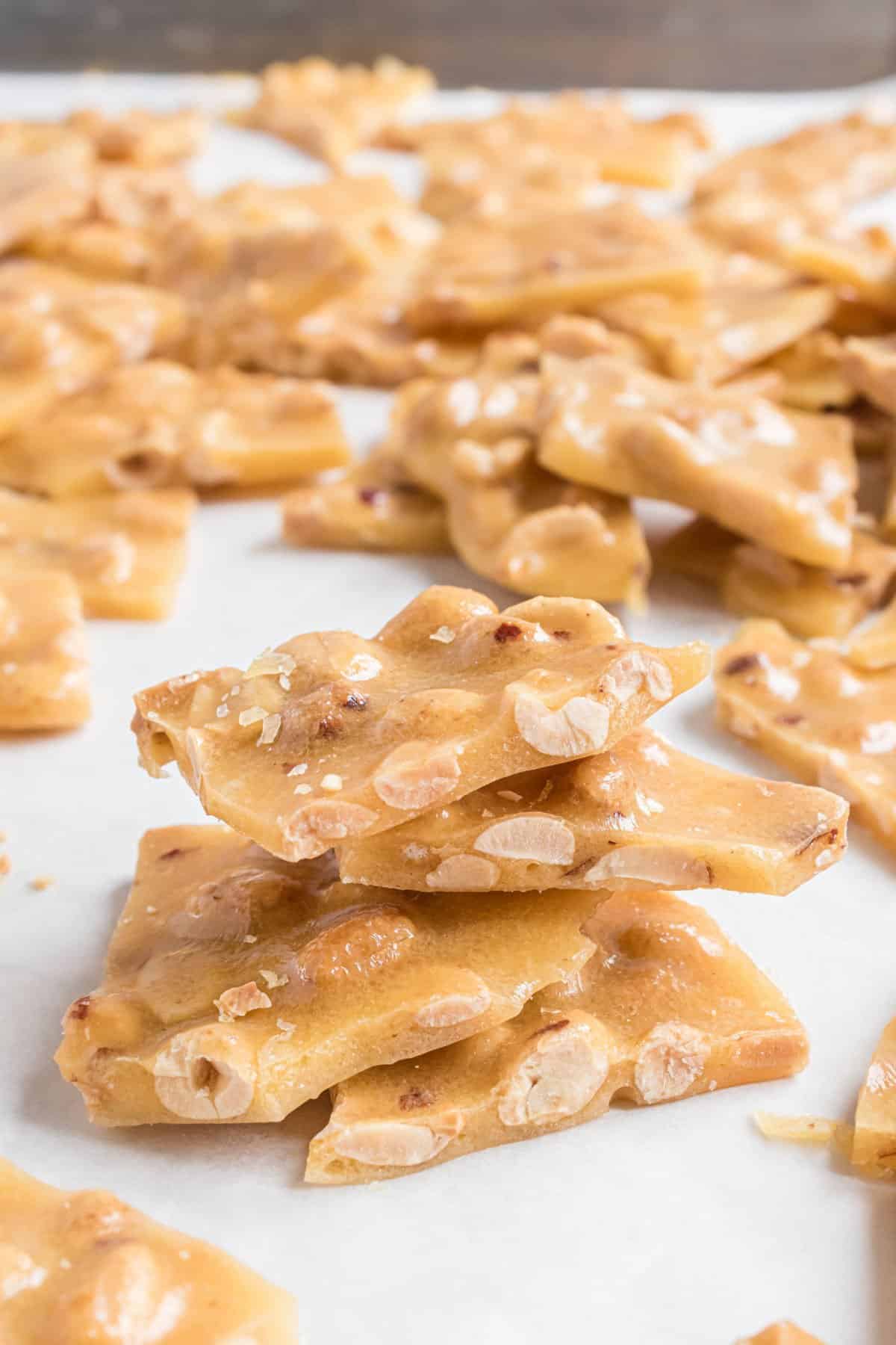 Peanut brittle stacked on top of eachother.