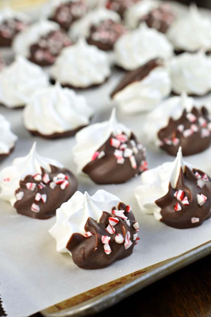 Chocolate Peppermint Meringue Cookies: sweet melt in your mouth meringues dipped in dark chocolate