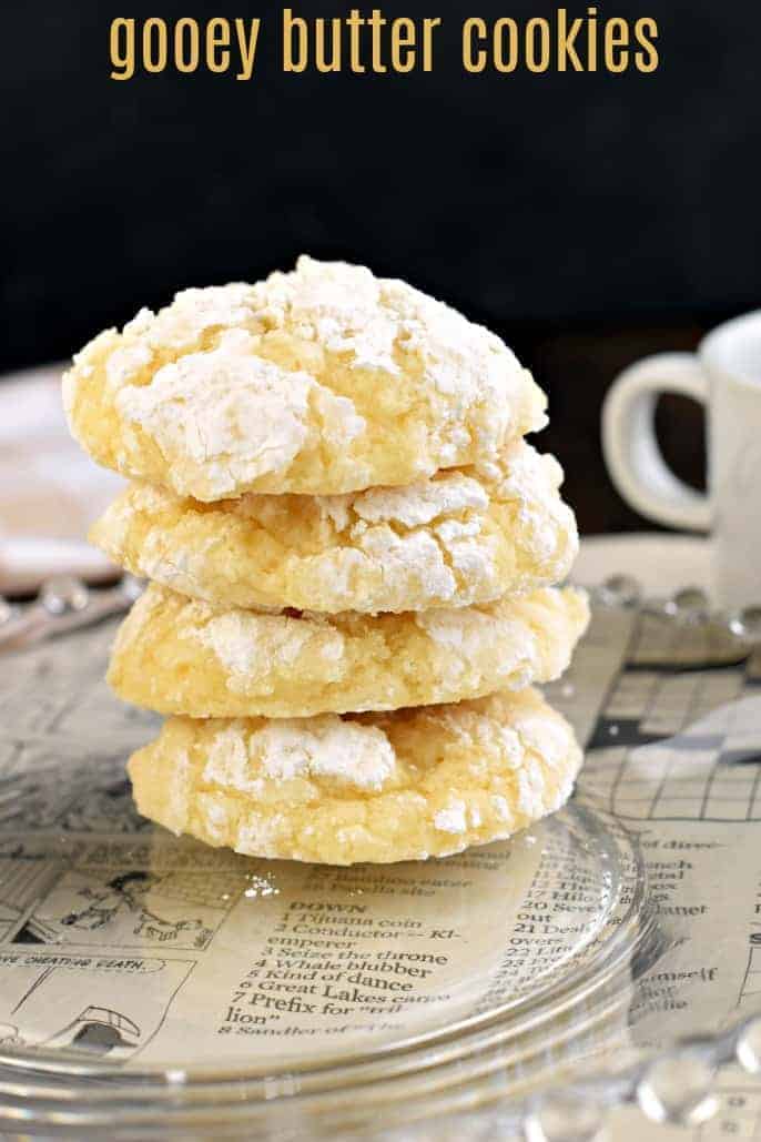 Stack of butter cookies rolled in powdered sugar.