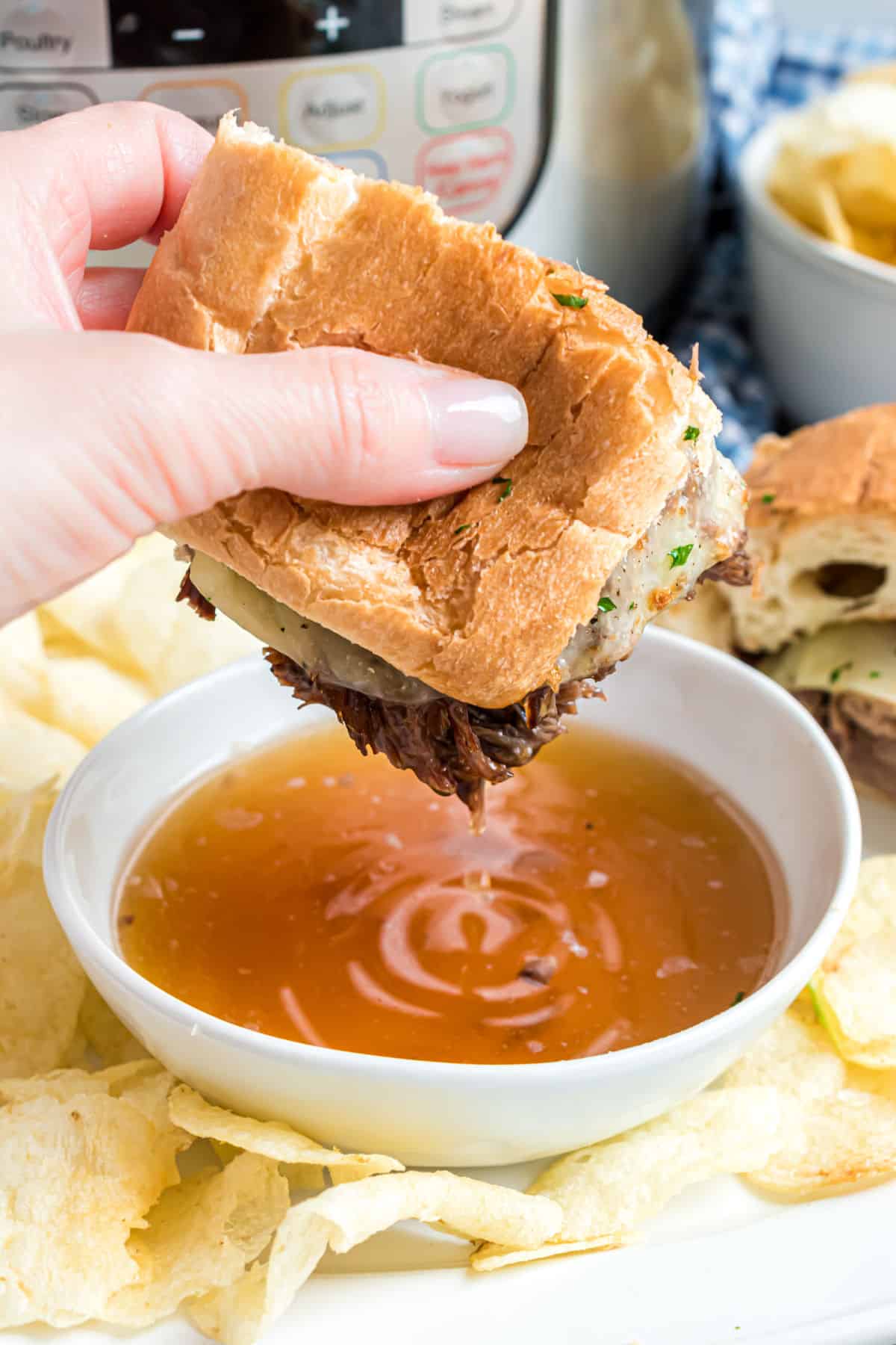 French dip sandwiches dipped in au jus.