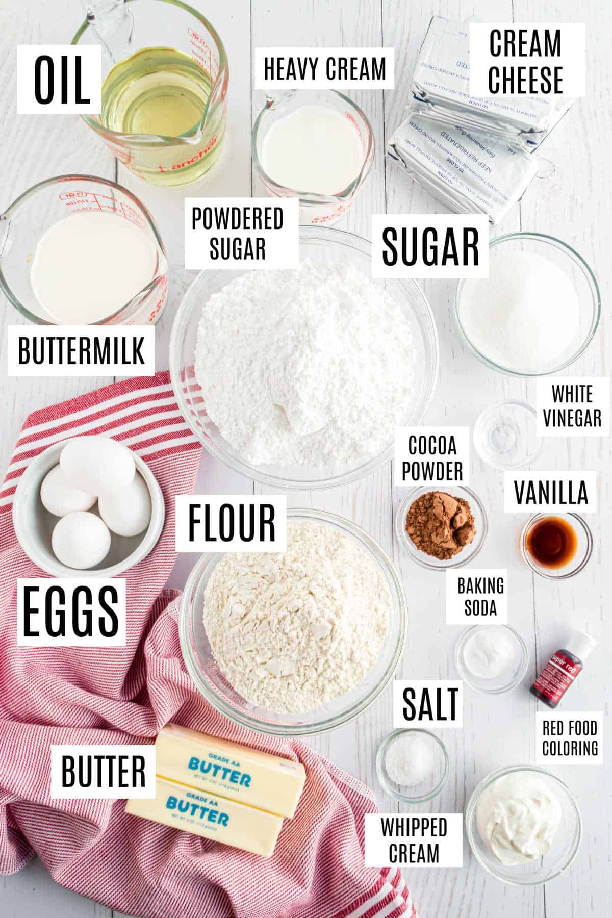 Ingredients needed to make red velvet cheesecake cake.