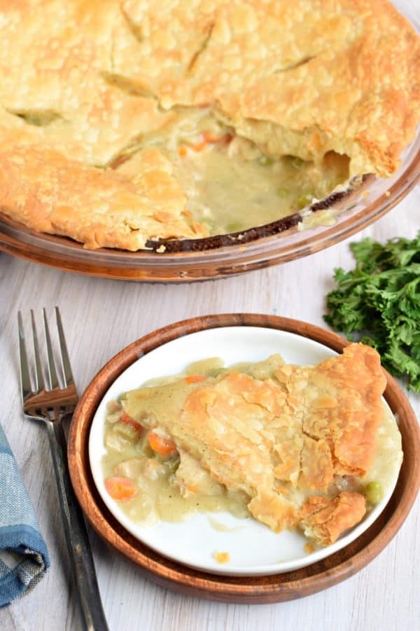 The Classic Homemade Chicken Pot Pie recipe. Warmth of a hearty chicken dinner in a flaky pie crust is the perfect comfort food.