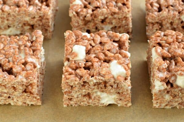 Get the tips and tricks to making the most PERFECT Cocoa Krispie Treats. Kid and adult friendly! THICK AND CHEWY!
