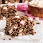 Get the tips and tricks to making the most PERFECT Cocoa Krispie Treats. Thick and chewy, these bars are kid-friendly, but adults love them too! 