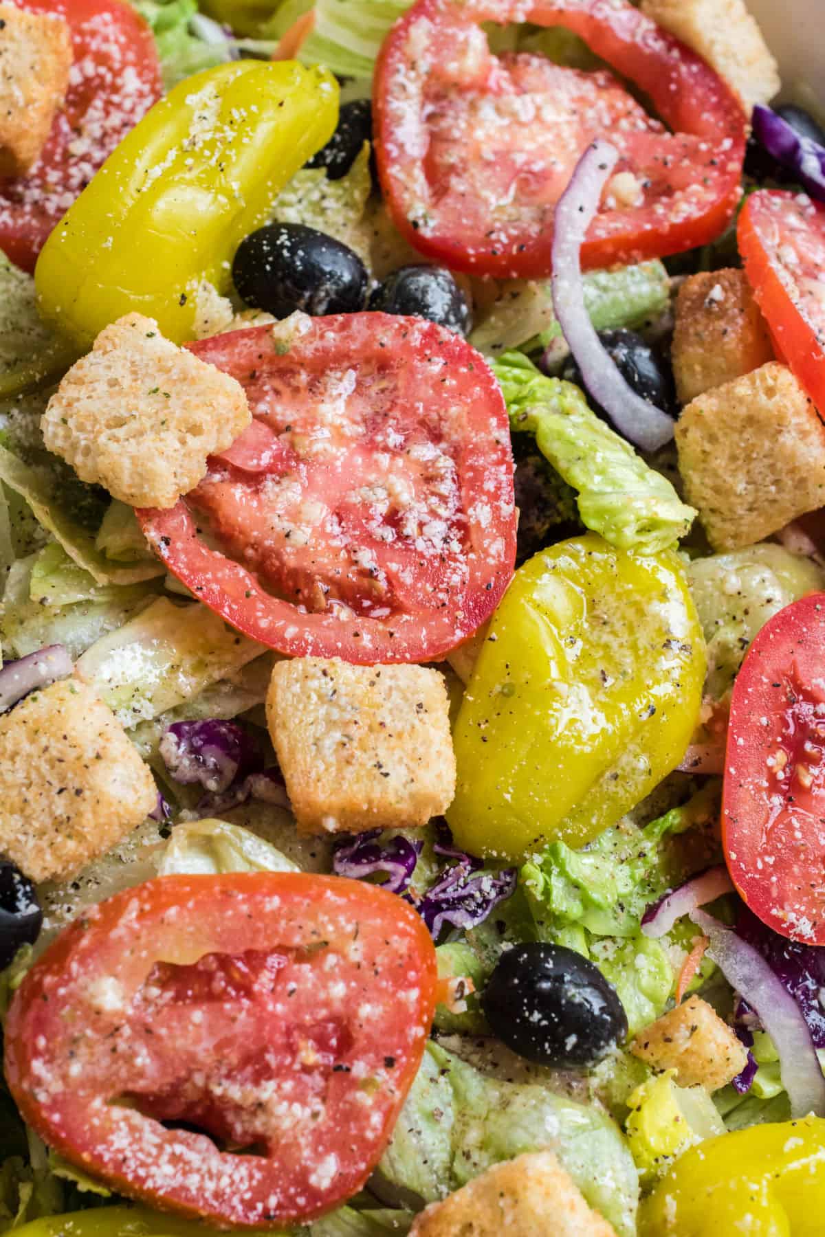 Close up of ingredients in an assembled olive garden salad.