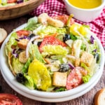This speedy Copycat Olive Garden salad recipe is loaded with fresh flavor and your new favorite dressing! We’ll use my secret ingredient to make it perfectly creamy and zesty. This simple side is a quick and healthy pairing for any weeknight meal.