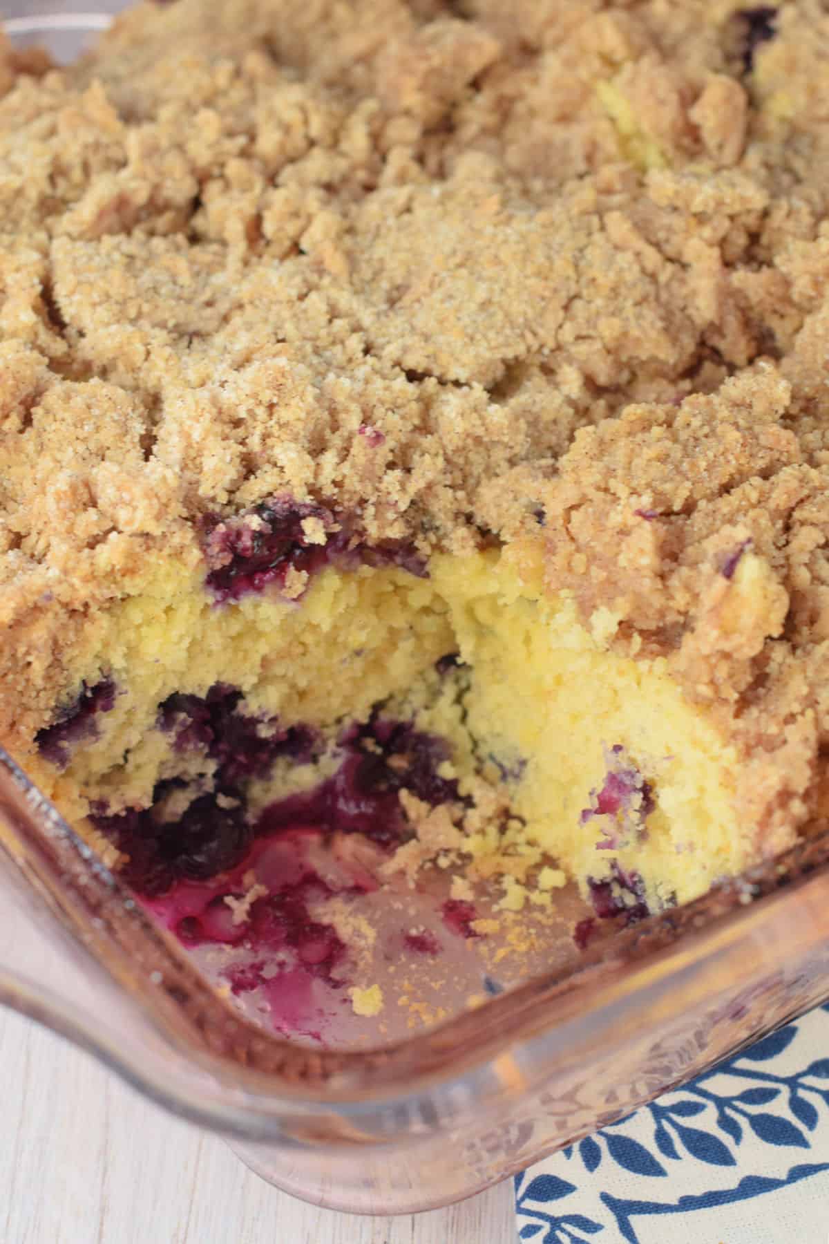 Blueberry buckle baked in a square baking dish.
