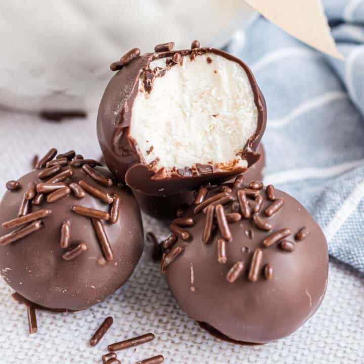 Buttercream Truffles came out of the need to use up extra frosting. Creamy vanilla filling dipped in rich chocolate for a delicious treat.