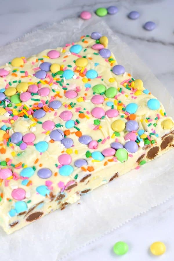 No matter the Spring holiday, this easy Easter Fudge recipe is perfect. Vanilla Fudge with pastel candies and sprinkles!