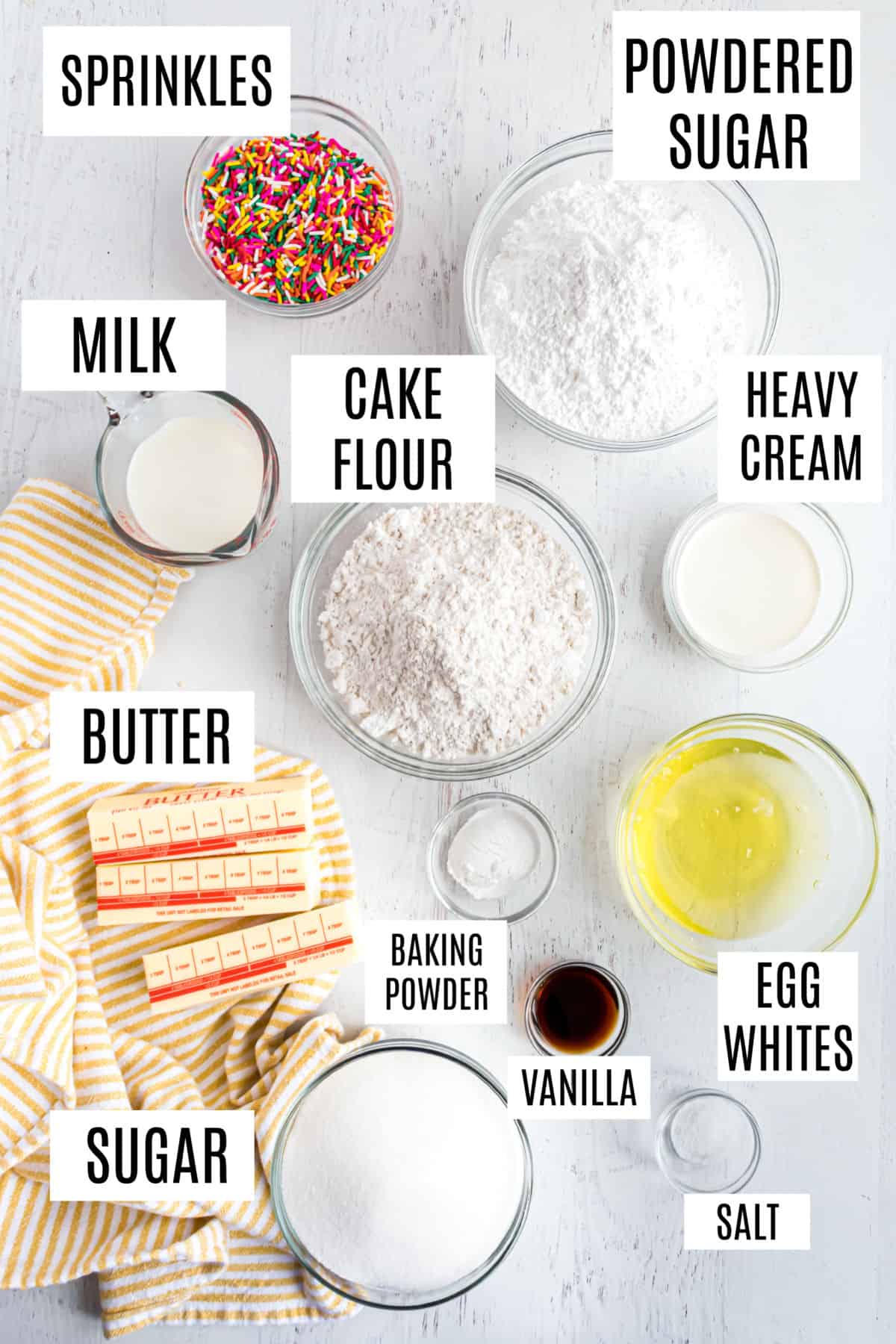 Ingredients needed to make a funfetti layer cake.