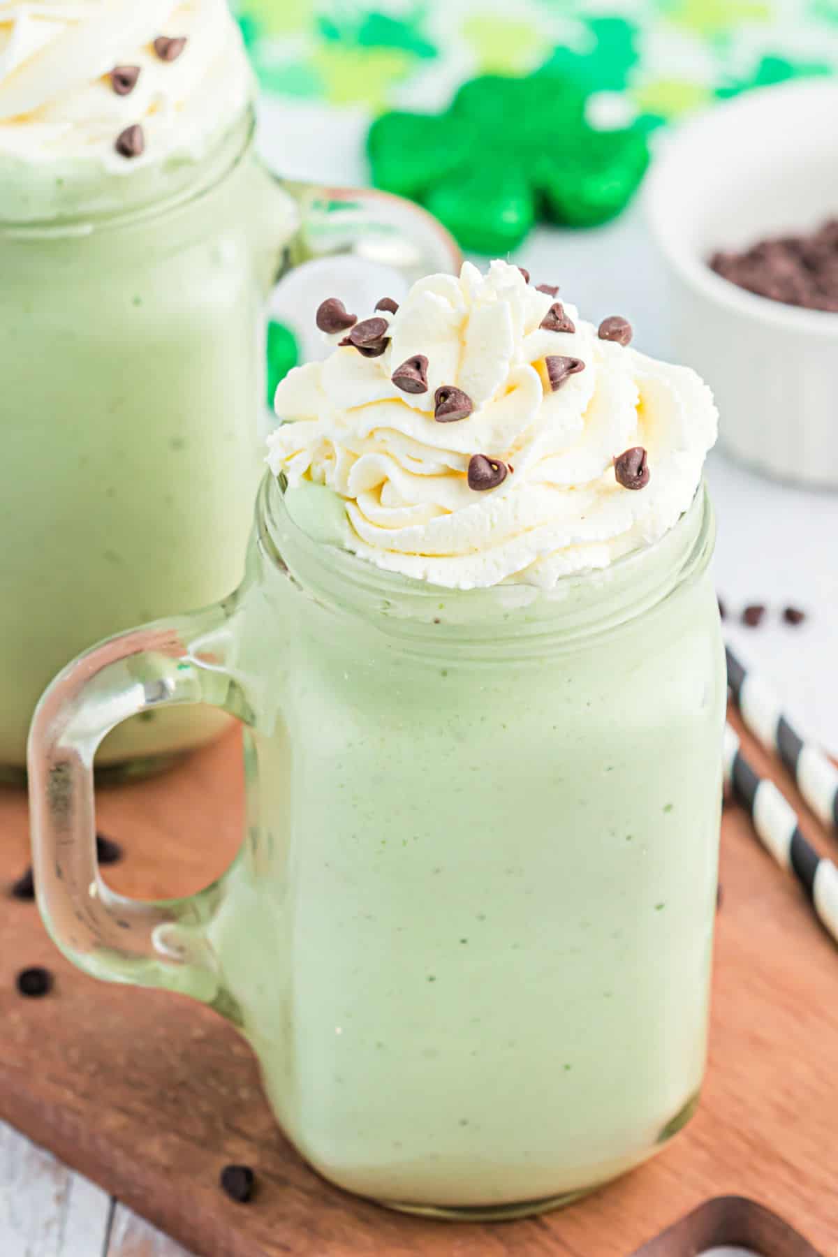 Clear glass mugs with green ice cream inside.