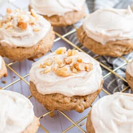 Banana cookies with cream cheese frosting and nuts.