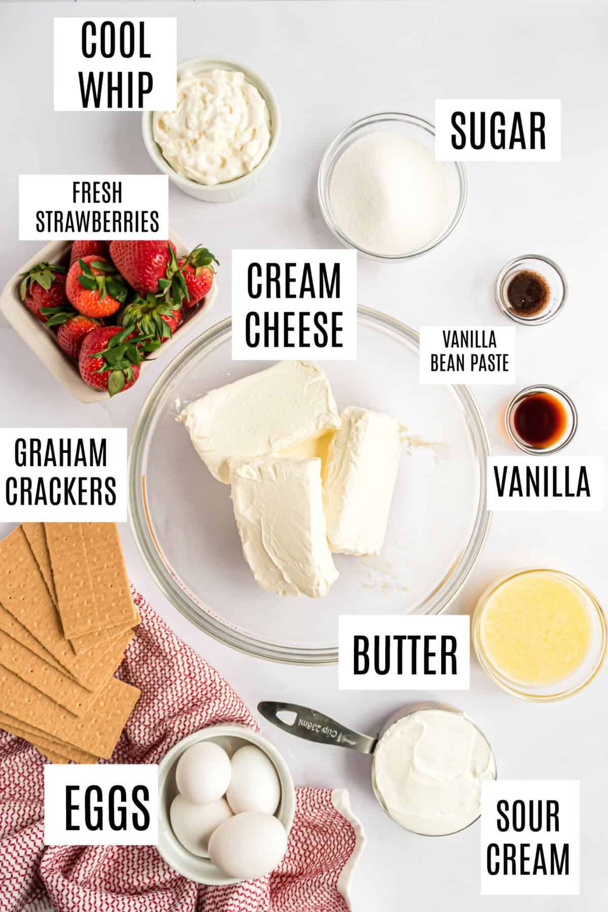 Ingredients needed to make homemade cheesecake.