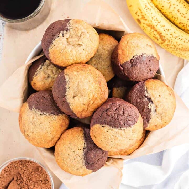 Chocolate Banana Muffins are two delicious muffins in one. You'll love the sweet flavor and duo of colors in this easy muffin recipe. Rich chocolate and moist banana combined.