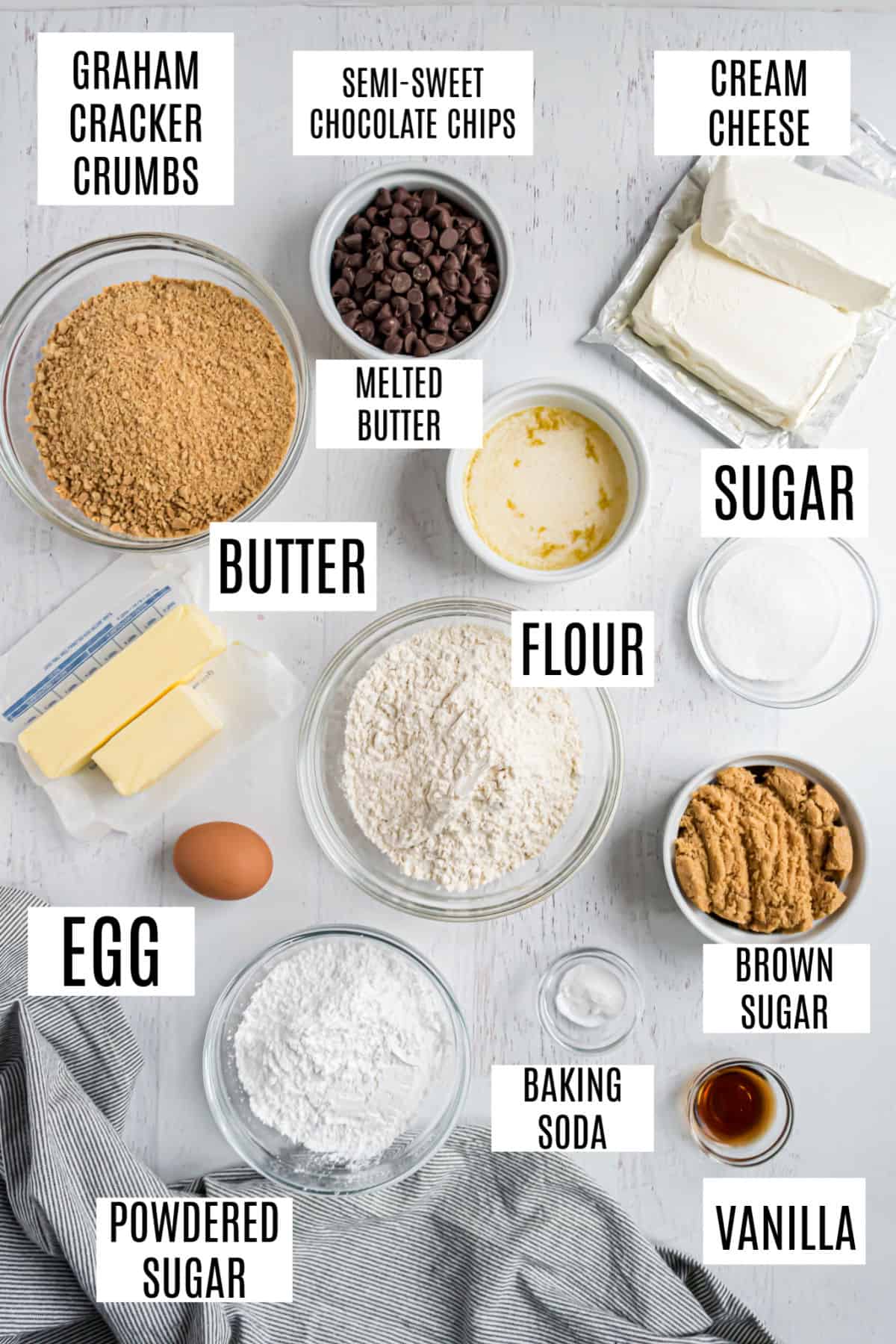 Ingredients needed to make chocolate chip cheesecake bars.