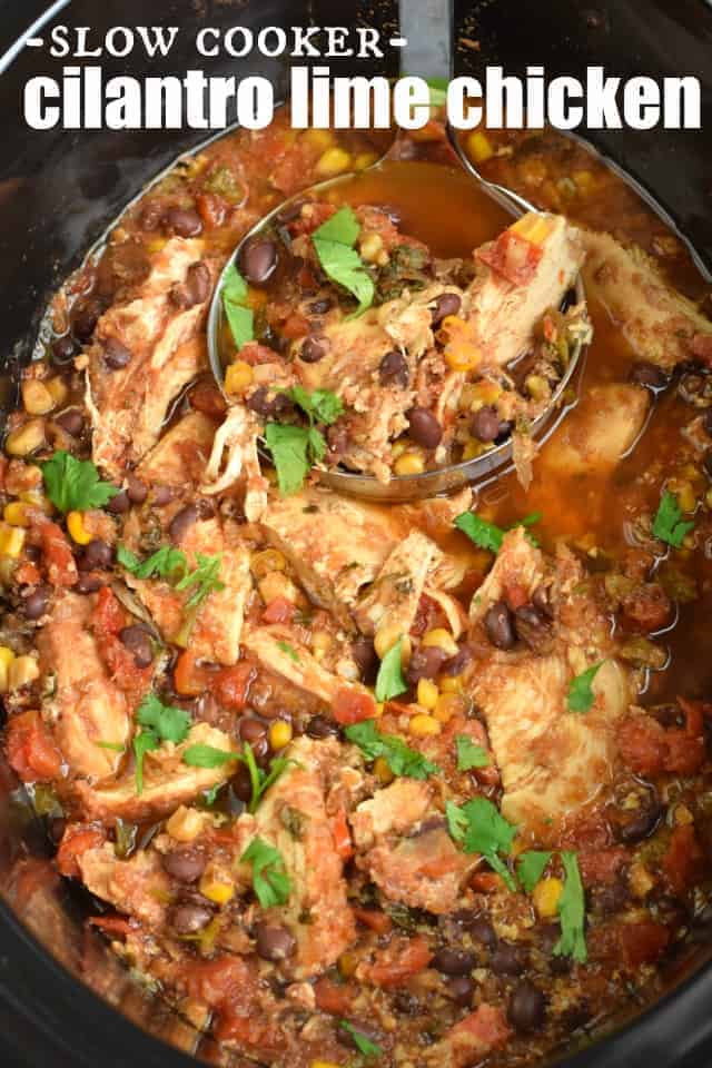 Chicken, corn, beans, rice in a slow cooker stew with cilantro and lime.