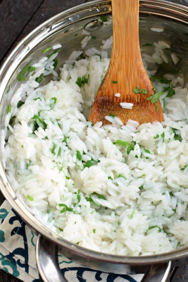 Colorful and packed with flavor, you'll love this Copycat Chipotle Cilantro Lime Rice recipe. It's the perfect side to any tex-mex meal!