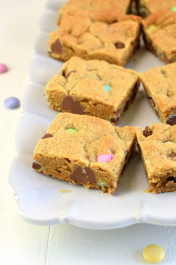 Soft and chewy M&M's Cookie Bars. Packed with brown sugar and chocolate, you won't be able to resist these cookie bars!