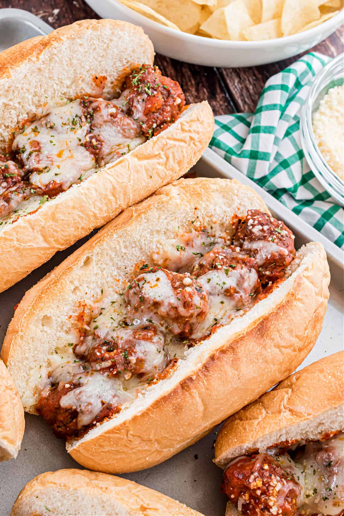 Meatball subs with melted cheese.