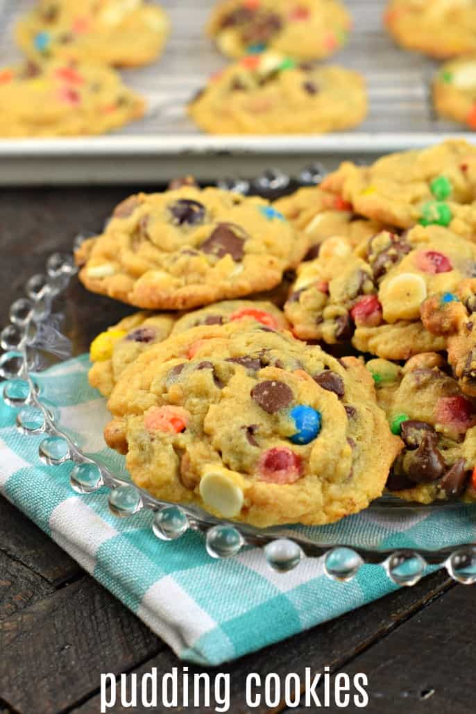 Pudding cookies stacked on clear glass plate.