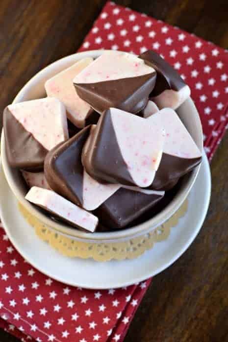 The BEST Peppermint Bark recipe is made with good quality chocolate, and dipped to perfection. You'll love this Christmas treat for yourself or to give as a gift!
