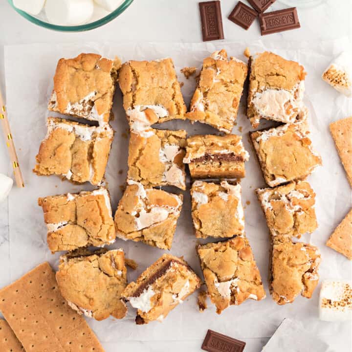 S'mores Cookie Bars are soft and chewy treats packed with graham crackers, marshmallow, and chocolate! These S'mores Bars are easy and delicious!