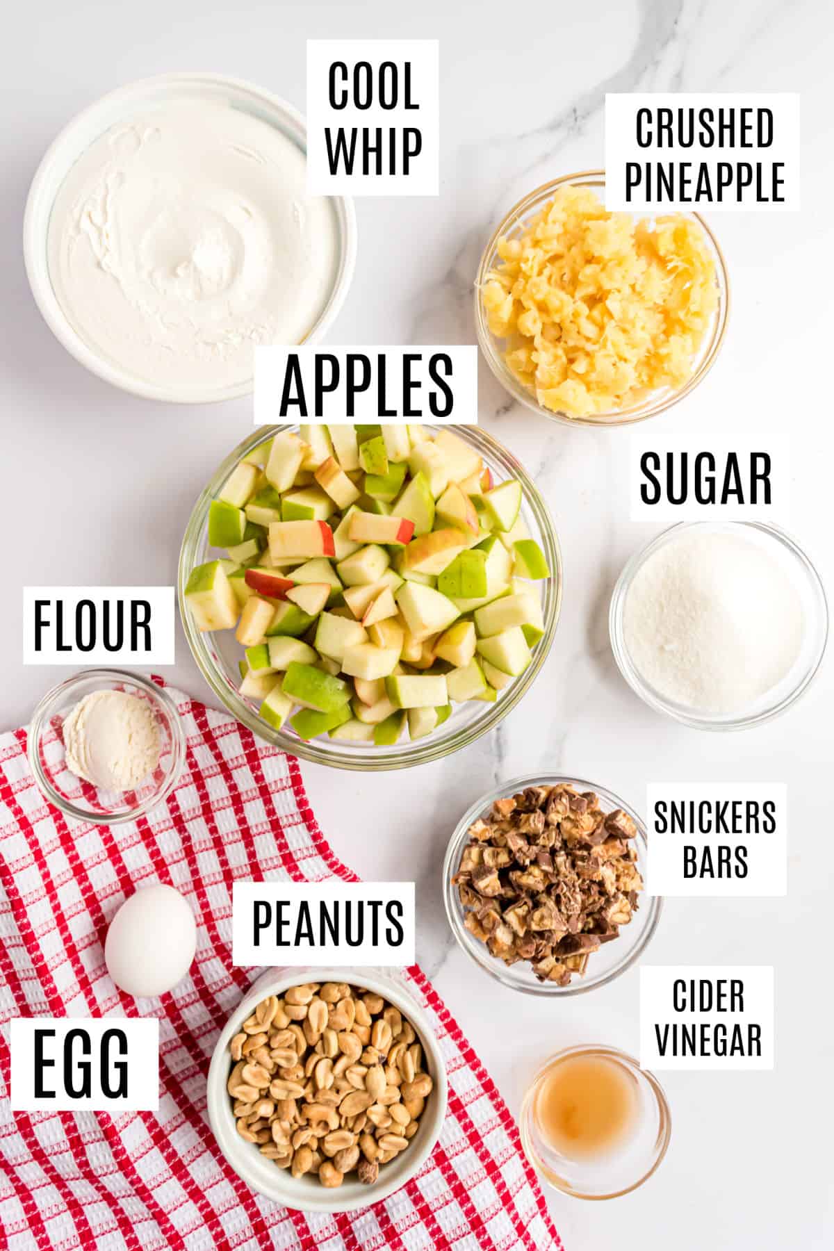Ingredients needed to make Snickers Salad.