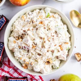 Snicker Caramel Apple Salad recipe is the perfect dessert for your next potluck. Whether serving this to your family or a crowd, it's always a 5-star recipe!