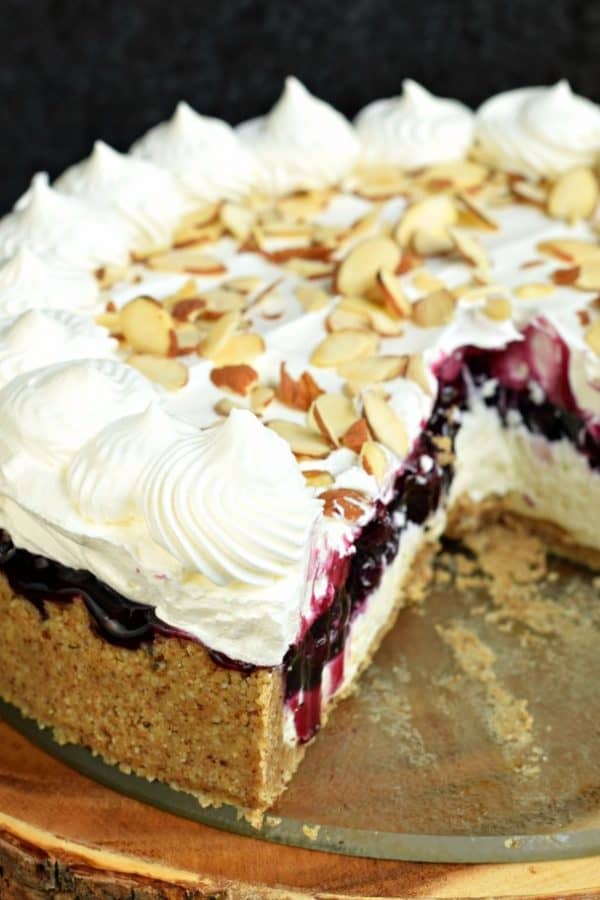 No Bake Blueberry Cheesecake recipe with almonds and a graham cracker crust. An easy dessert idea for summer, or any holiday!