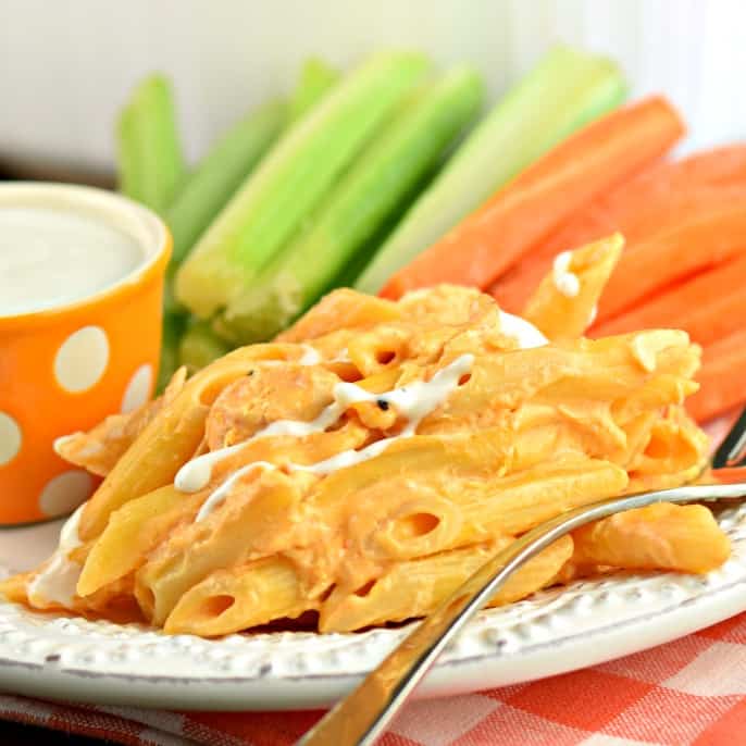 Buffalo Chicken Pasta Casserole is an easy chicken dinner packed with cream cheese, buffalo sauce, and cheese. Just like buffalo chicken dip, once you start eating it's hard to stop!