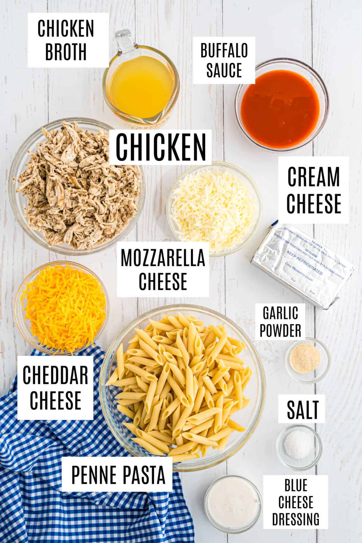 Ingredients needed to make buffalo chicken pasta bake.