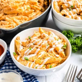 Buffalo Chicken Pasta Casserole is an easy chicken dinner packed with cream cheese, buffalo sauce and cheese. Just like buffalo chicken dip, once you start eating, it's hard to stop!