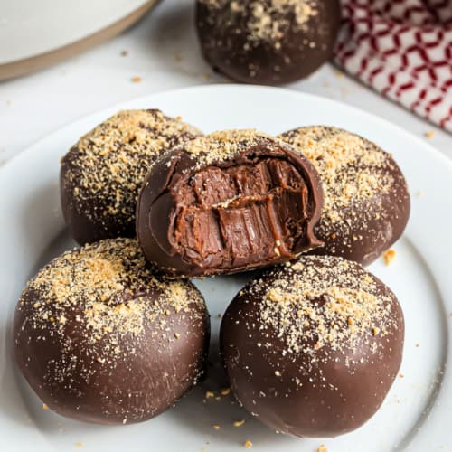 Rich and decadent, these truly are EASY Chocolate Truffles! Perfect for a delicious treat, Valentine's Day, or to give as a gift.