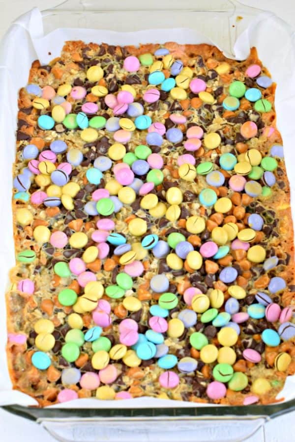 The BEST, Easy Magic Cookie Bars recipe is now at your fingertips. You'll love this 7 layer, chewy treat, that's so versatile for holidays or any day!