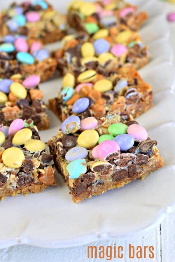 The BEST, Easy Magic Cookie Bars recipe is now at your fingertips. You'll love this 7 layer, chewy treat, that's so versatile for holidays or any day!