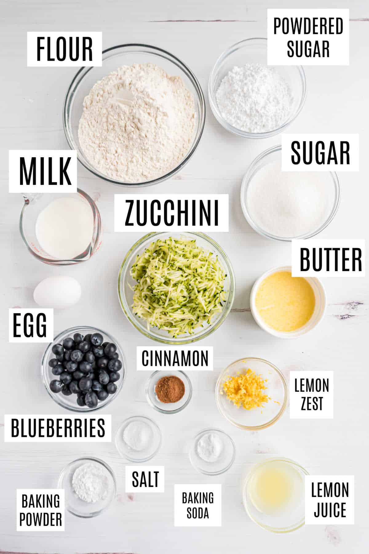 Ingredients needed to make zucchini bread with blueberries.
