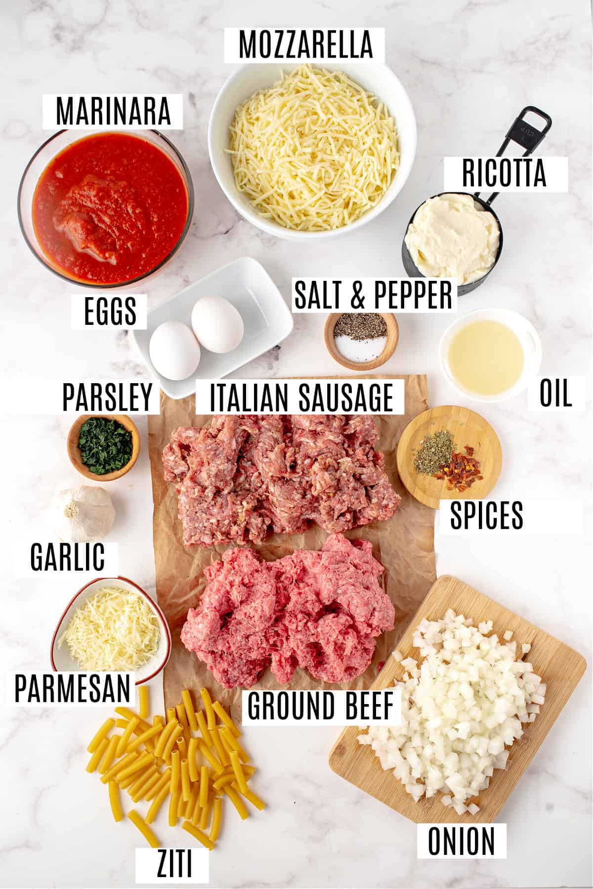 Ingredients needed to make baked ziti.