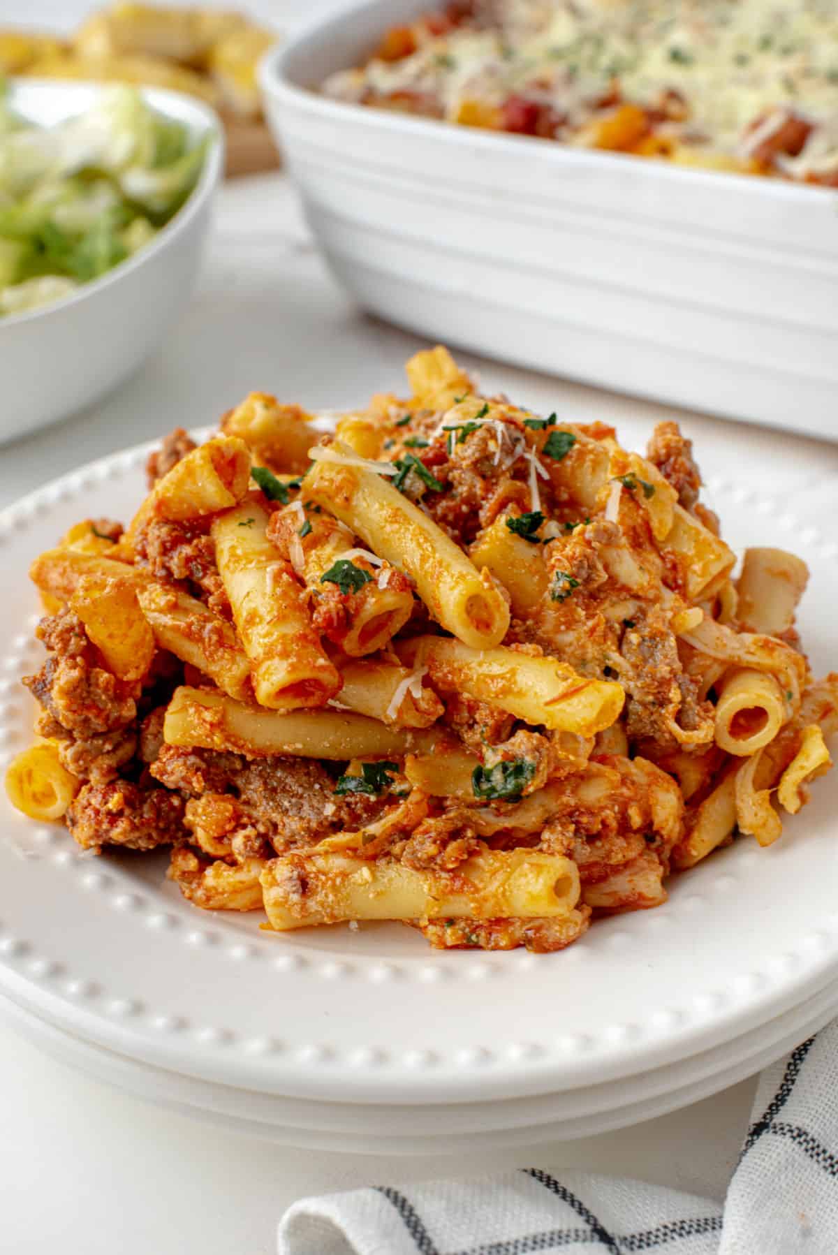 Baked ziti served on a white plate.