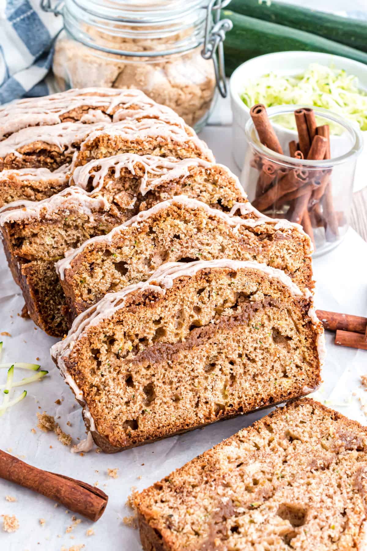 Slices of zucchini bread with cinnamon swirl.