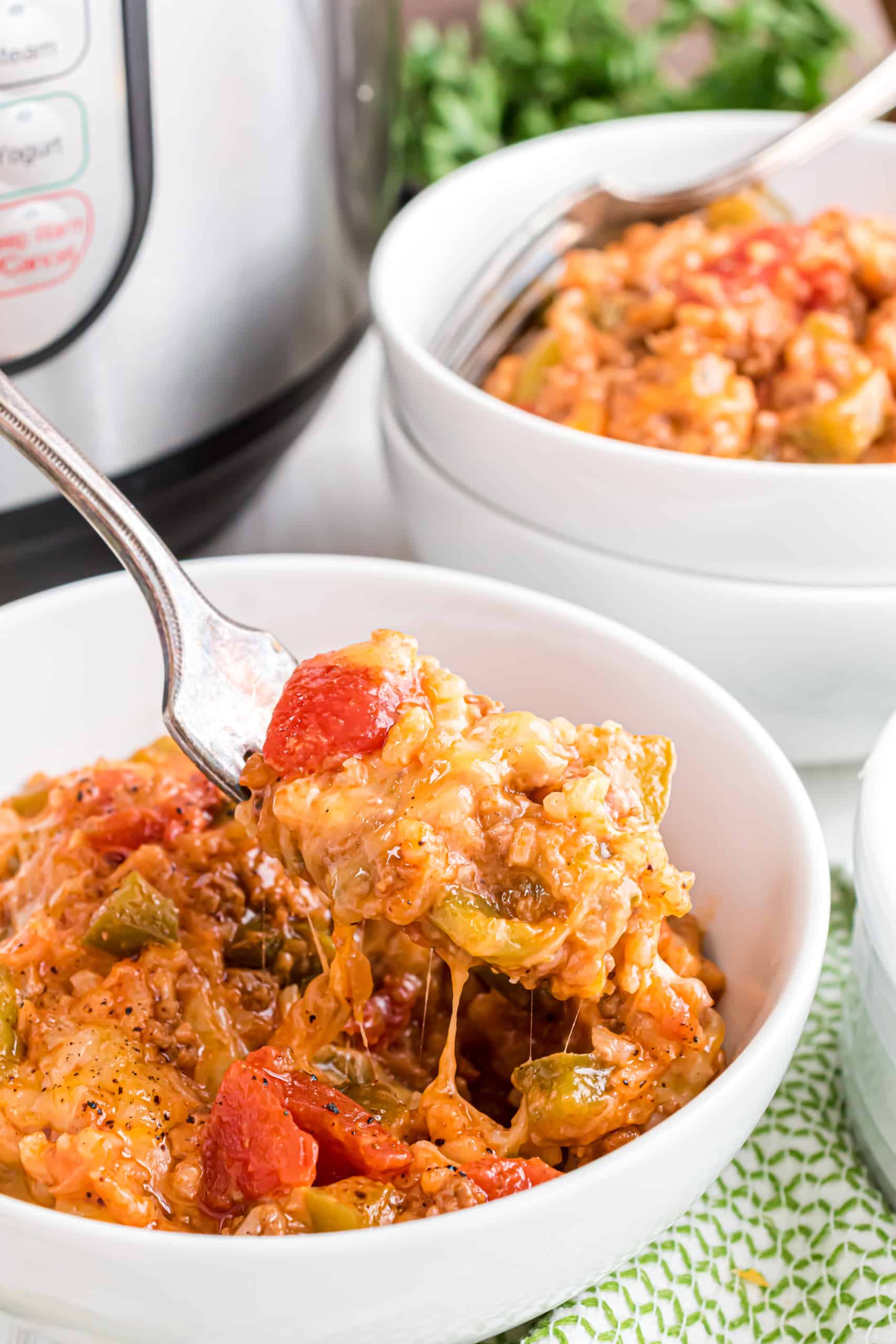 Stuffed pepper casserole served in a white bowl.